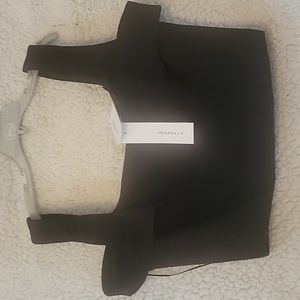 N/Nicholas black crop top with back zipper. Size US 2.ñ Super cute for going out